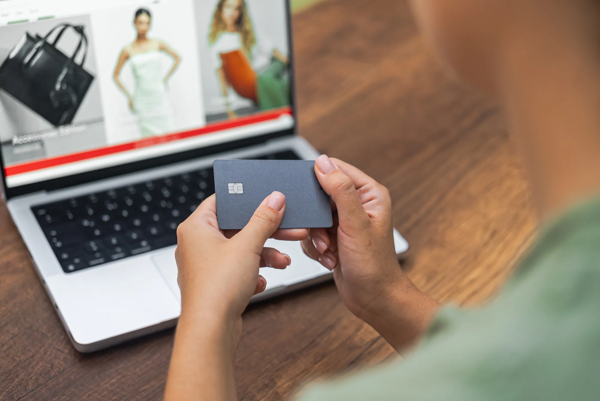 Person shopping online with a credit card