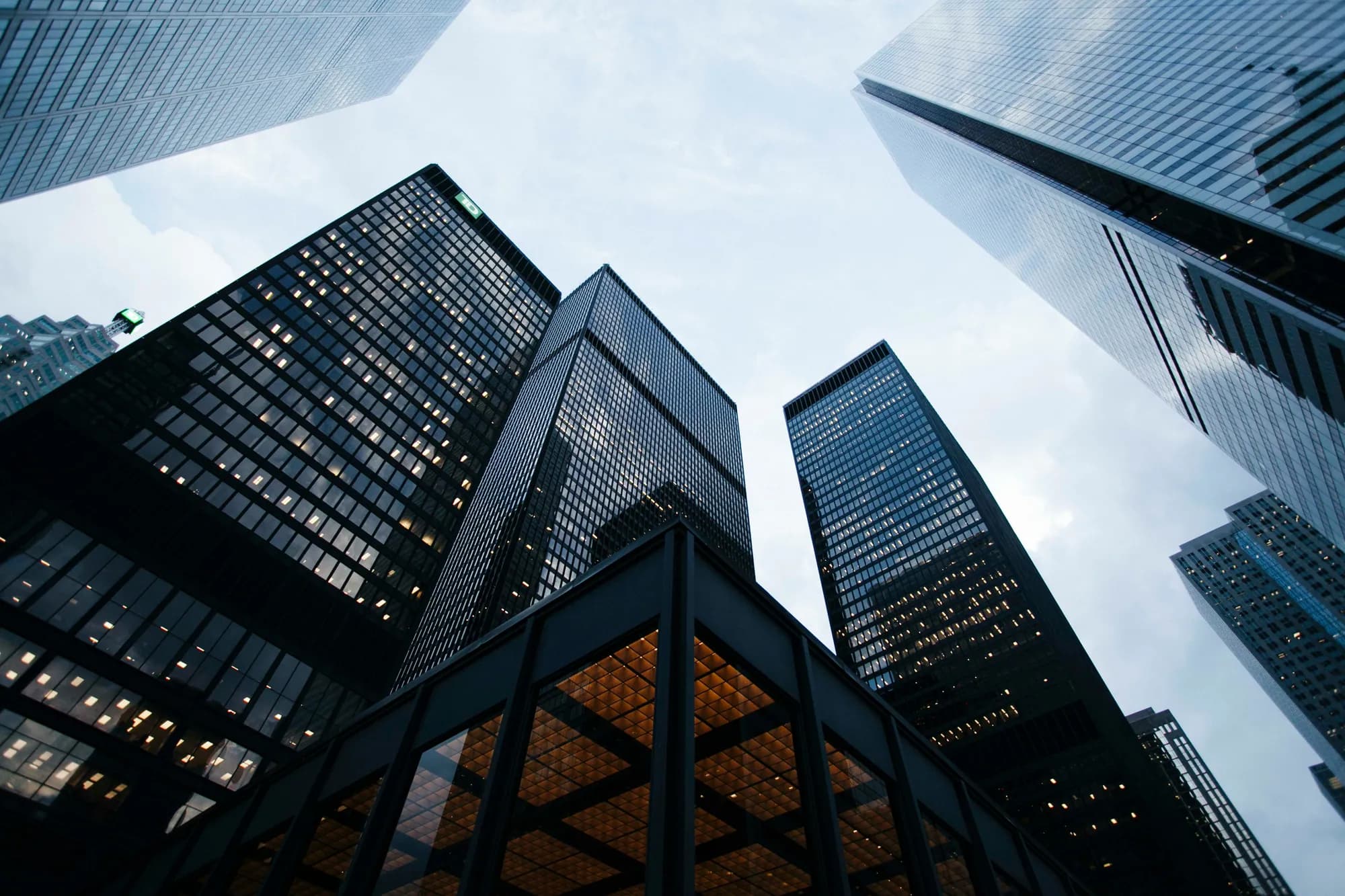 City skyscrapers viewed from below — scale and presence